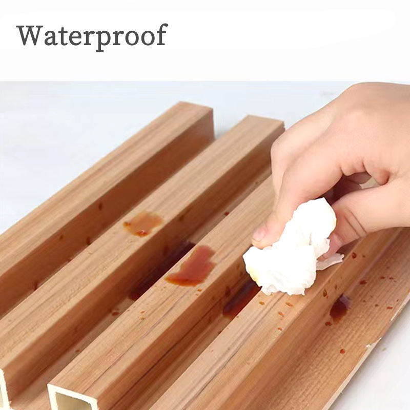 Pannello murale in PVC WPC con venatura del legno, pannello scanalato 3D per la decorazione